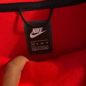 Red Nike Tech , Jacket and Pants size XS both